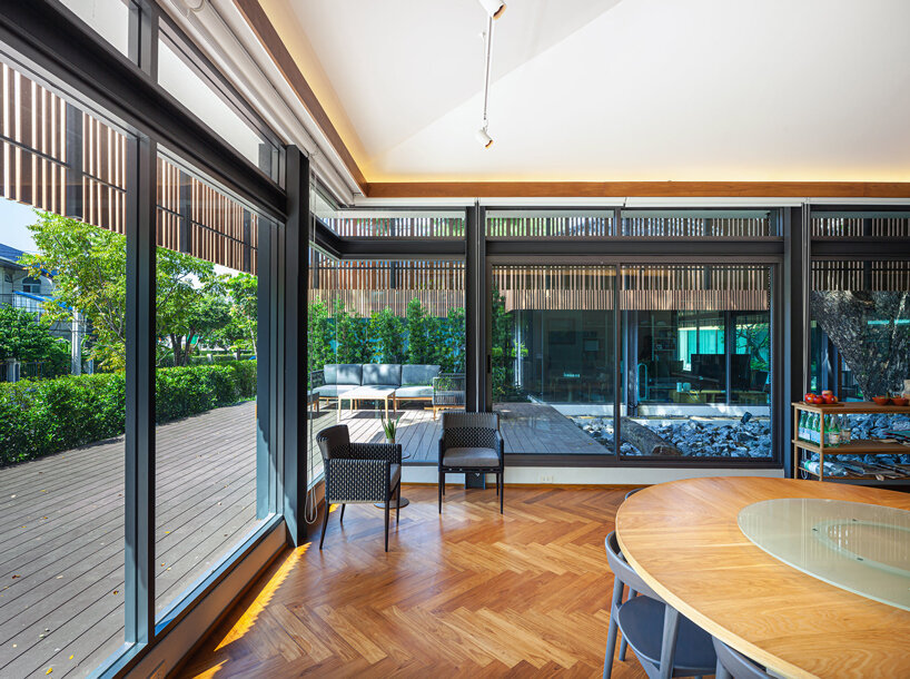 junsekino plans 'o-tree house' around a lush courtyard in thailand designboom