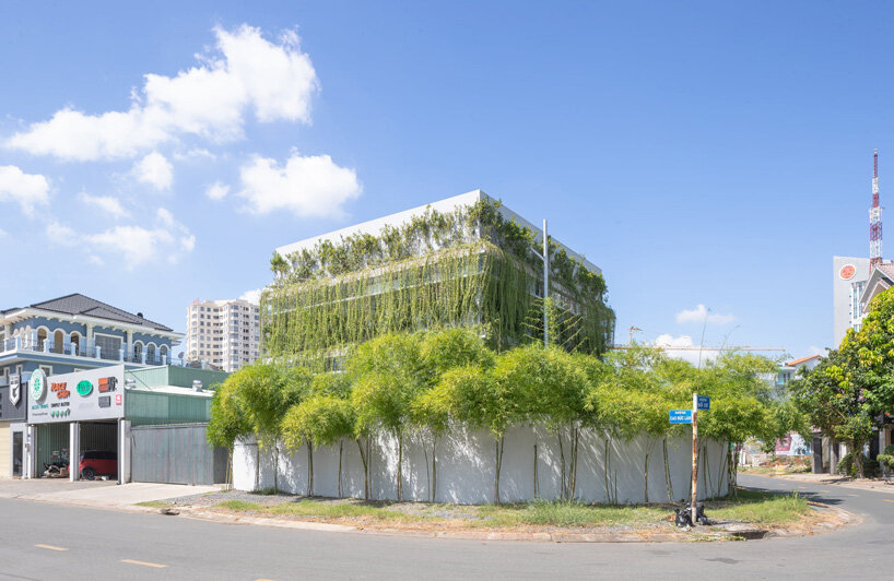 MIA design studio builds own office in vietnam as open plan volume wrapped in greenery
