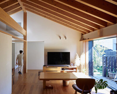 n.yamada architect and associates builds two houses for one family in miyazaki, japan