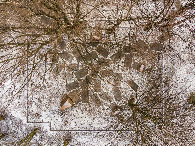 gray sandstone slabs compose NArchitekTURA great synagogue memorial park in poland