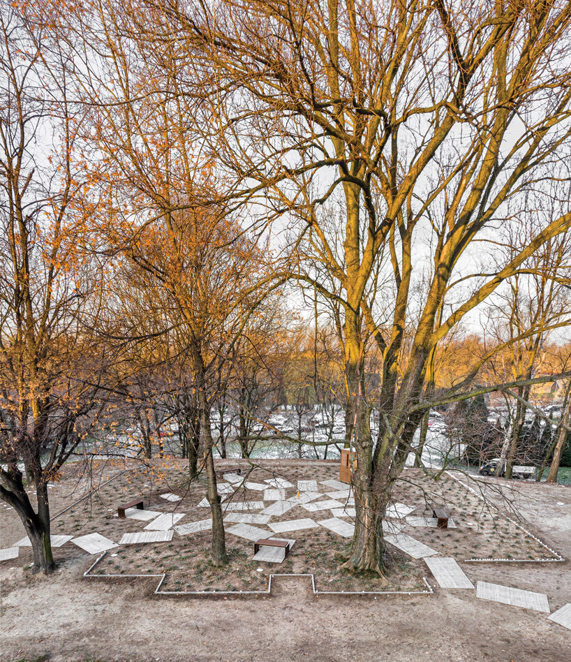 gray sandstone slabs compose NArchitekTURA great synagogue memorial park in poland
