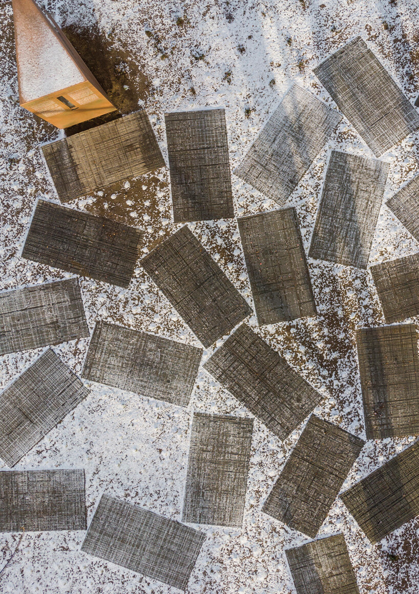 gray sandstone slabs compose NArchitekTURA great synagogue memorial park in poland