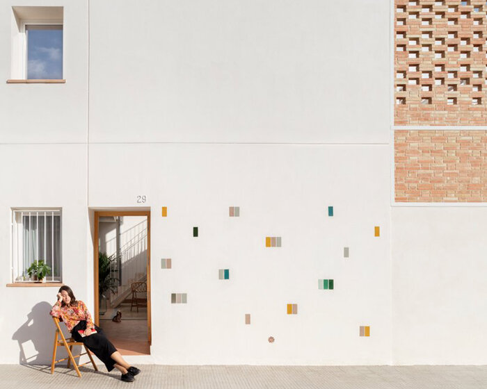 a perforated brick terrace tops this family house in valencia by piano piano studio