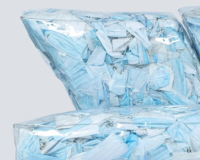 couch-19 is a sofa filled with used masks, by tobia zambotti