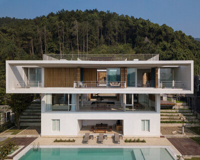 tropical space designs square-shaped 'tam dao villa' around open atrium in vietnam