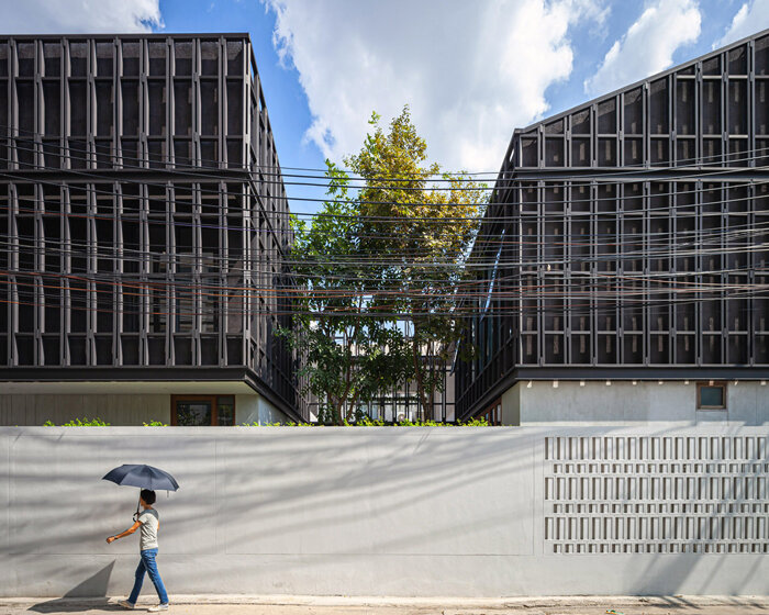 beautbureau plans a house and office around two green courtyards in bangkok