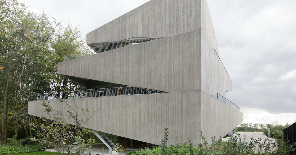 Form design idea #426: graux & baeyens architecten stacks concrete wedges to form ‘house N-DP’ in belgium