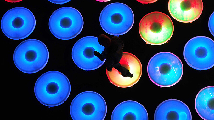 jen lewin installs reflect, an interactive light installation at brooklyn's domino park