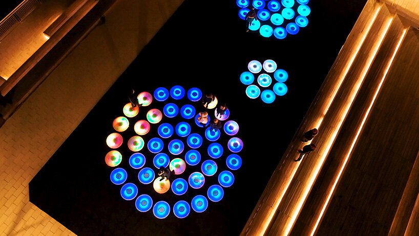 jen lewin installs reflect, an interactive light installation at brooklyn's domino park