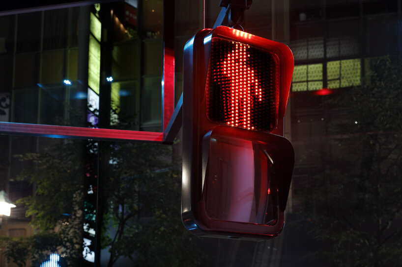 walking pedestrian signals animate shiseido tokyo show window installation by LUCENT