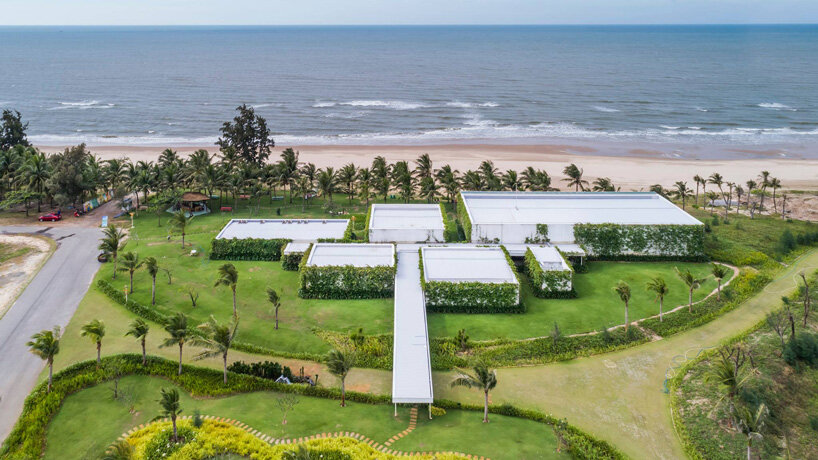 MIA design studio's thanh long bay gallery frames panoramic views of the ocean in vietnam