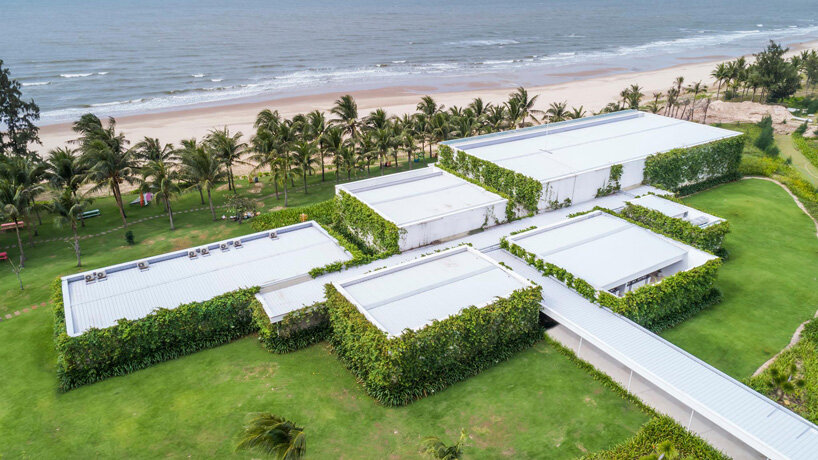 MIA design studio's thanh long bay gallery frames panoramic views of the ocean in vietnam