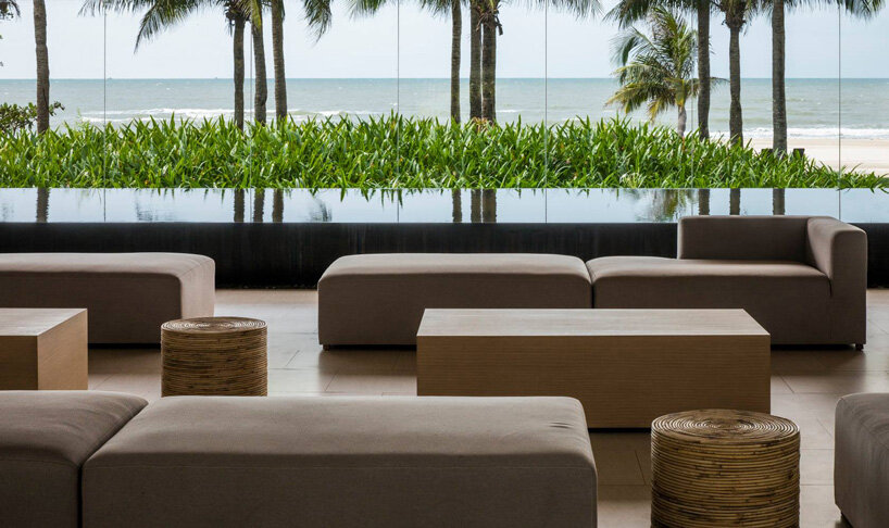 MIA design studio's thanh long bay gallery frames panoramic views of the ocean in vietnam