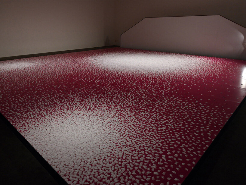 motoi yamamoto installs 100.000 salt cherry blossom petals at setouchi city art museum