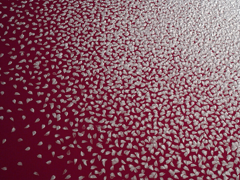 motoi yamamoto installs 100.000 salt cherry blossom petals at setouchi city art museum