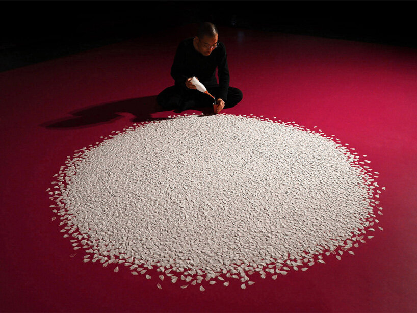 motoi yamamoto installs 100.000 salt cherry blossom petals at setouchi city art museum