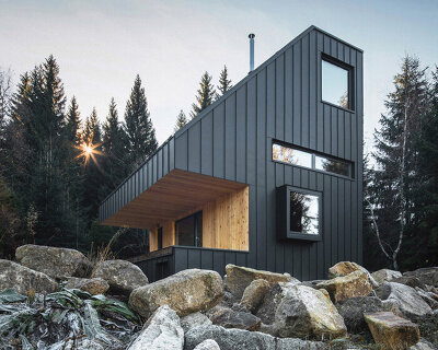 NEW HOW completes its weekend house nové hamry as a lookout tower in the mountains