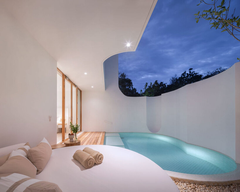 intimate courtyards form this beach resort in thailand designed by onion designboom