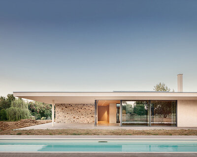 studio contini clads residential house in italy around three patios