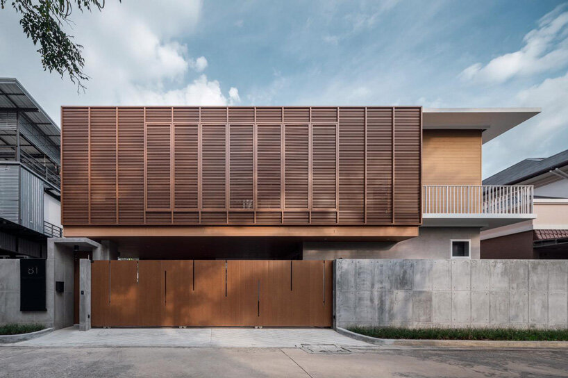 TOUCH architect conceals private courtyard behind louver façade in this house in thailand