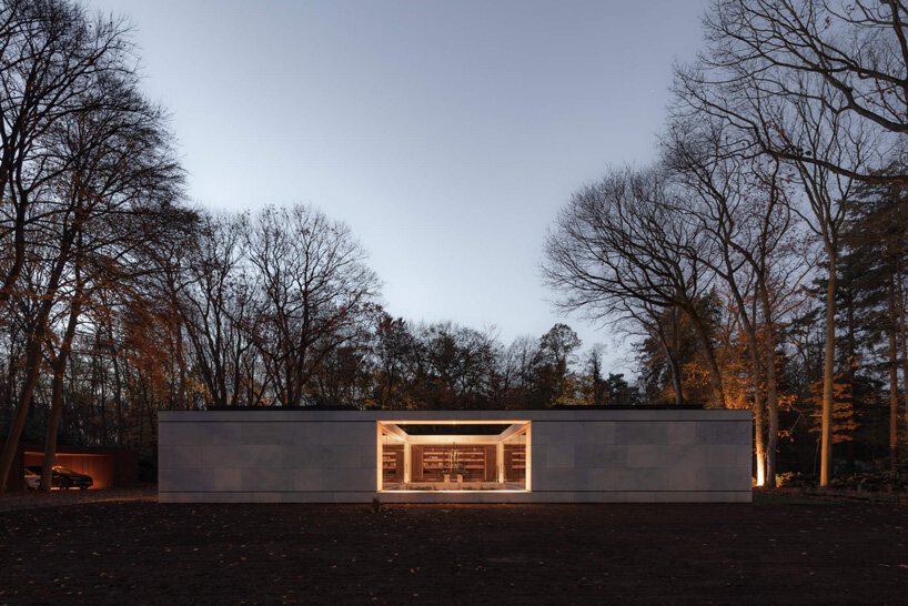 powerhouse company completes linear stone villa in the netherlands with central courtyard