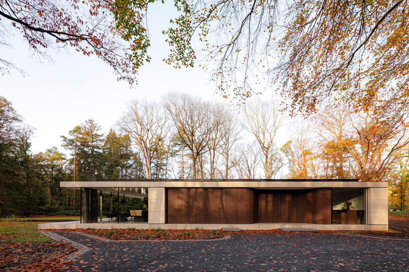 powerhouse company completes linear stone villa in the netherlands with central courtyard