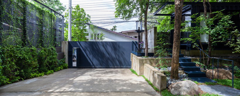 trees populate walllasia's mac & ham house in bangkok designboom