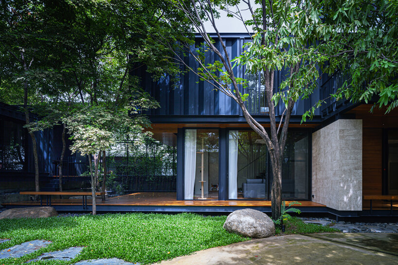 trees populate walllasia's mac & ham house in bangkok designboom