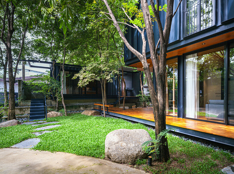 trees populate walllasia's mac & ham house in bangkok designboom