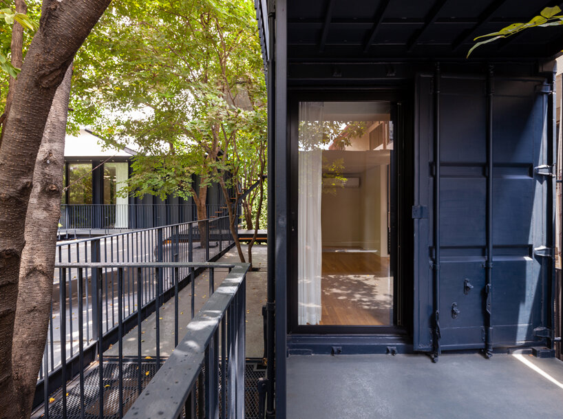 trees populate walllasia's mac & ham house in bangkok designboom