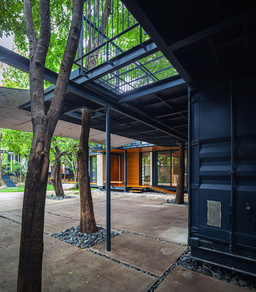 trees populate walllasia's mac & ham house in bangkok designboom