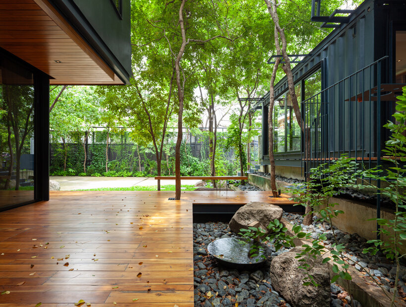 trees populate walllasia's mac & ham house in bangkok designboom