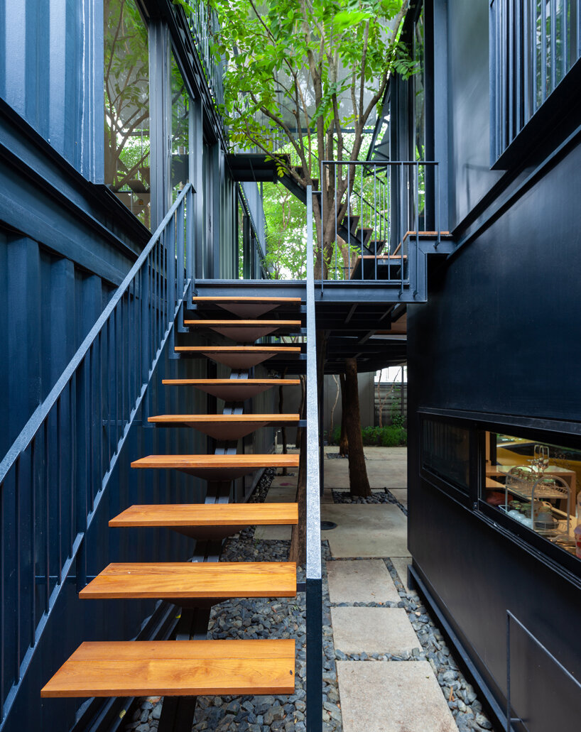 trees populate walllasia's mac & ham house in bangkok designboom