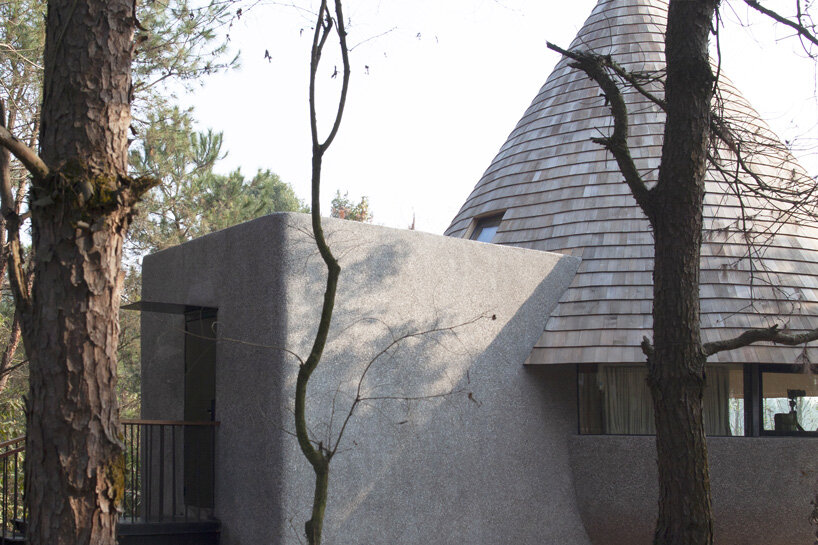 ZJJZ atelier tops 'the mushroom' guest house with cone-shaped roof in china's jiangxi forest