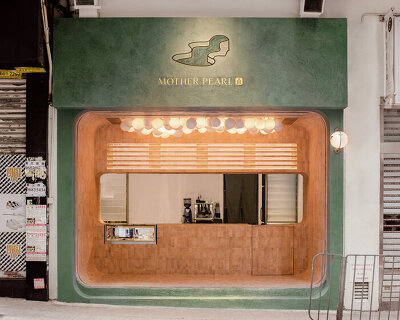olive green and terracotta brick adorn a vegan bubble tea shop in hong kong
