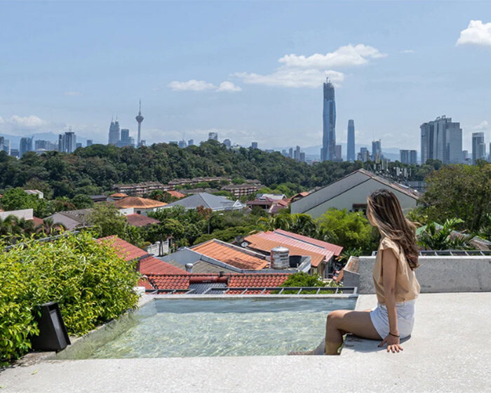 fabian tan designs rooftop viewing platform with pool on 'ottiqa house' in kuala lumpur