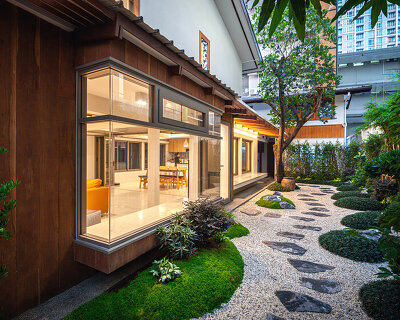junsekino renovates an 80-year-old house in bangkok with light, open spaces