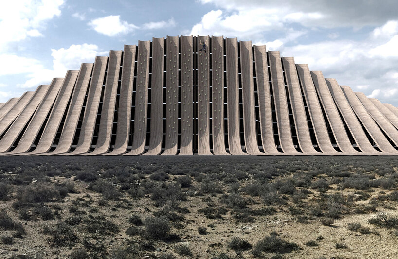 NUDES plans an undulating 'solar mountain' for burning man's fly ranch designboom