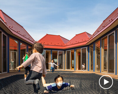 clashing colors and playful landscapes complete teamLab architects' nursery in japan
