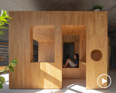 tropical space adds multipurpose wooden box for children in the center of this vietnam house