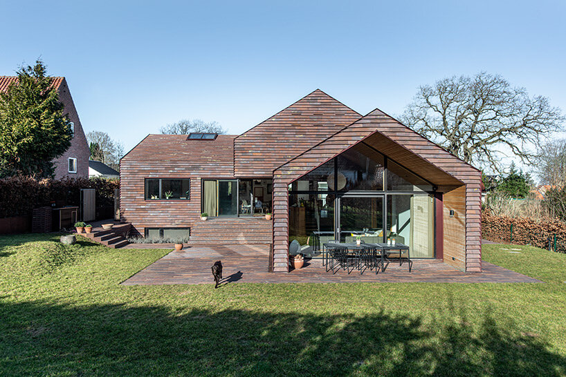 C.F. møller merges small brick-clad houses with gable roofs into 'villa E' in denmark