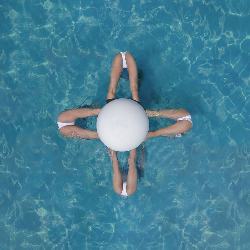 brad walls captures synchronized swimmers from above