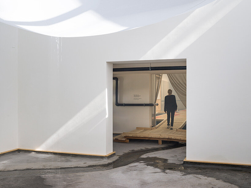 danish pavilion at the venice biennale immerses visitors in a cyclic water system