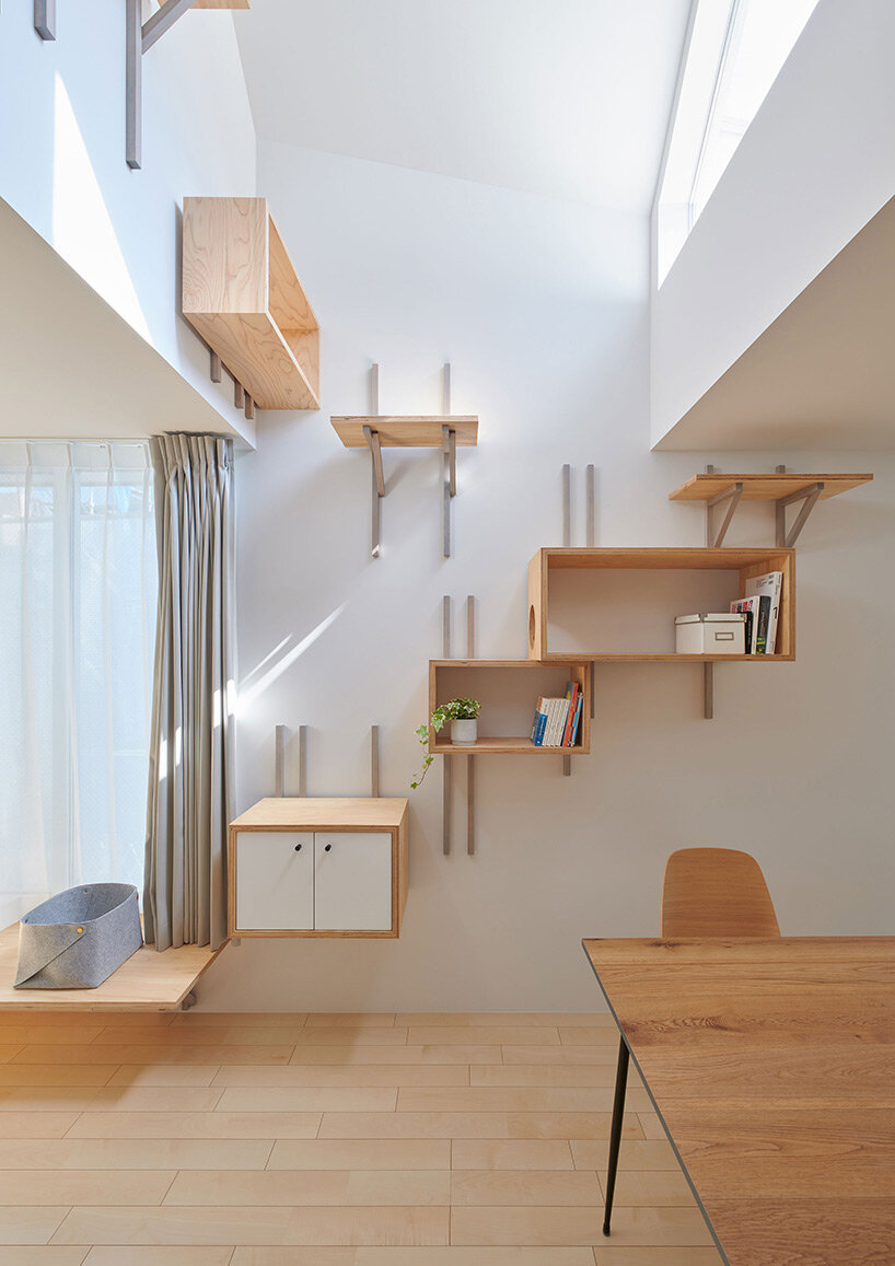 twisted diagonal volumes form house by GENETO accommodating both humans and cats