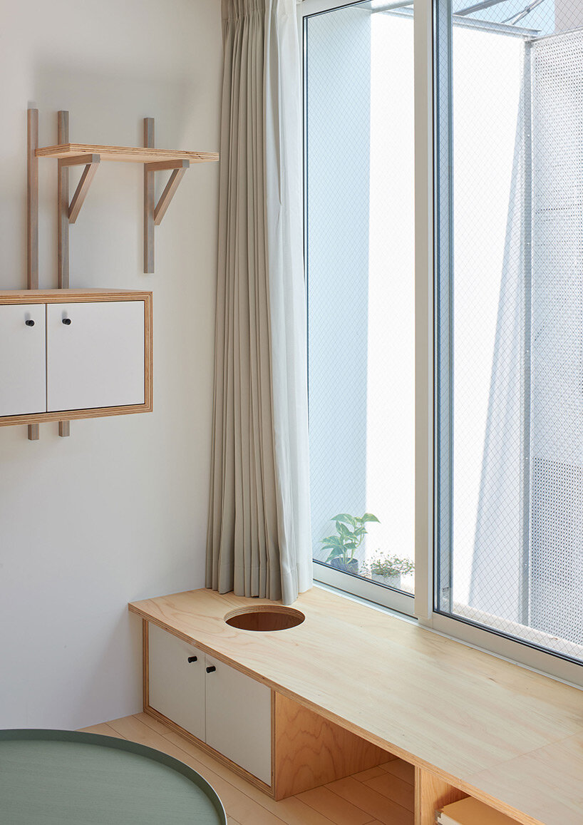 twisted diagonal volumes form house by GENETO accommodating both humans and cats