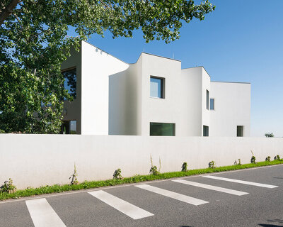 no architects' montessori kindergarten is a soft, playfully-designed volume
