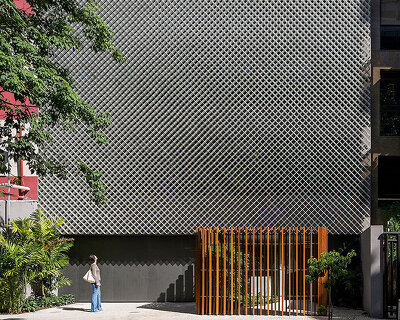 perforated metal façade decorates bernardes arquitetura's office block in brazil