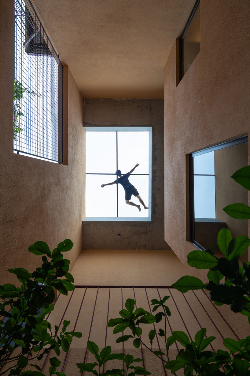 this vietnamese family house by toob studio is deliberately left unfinished