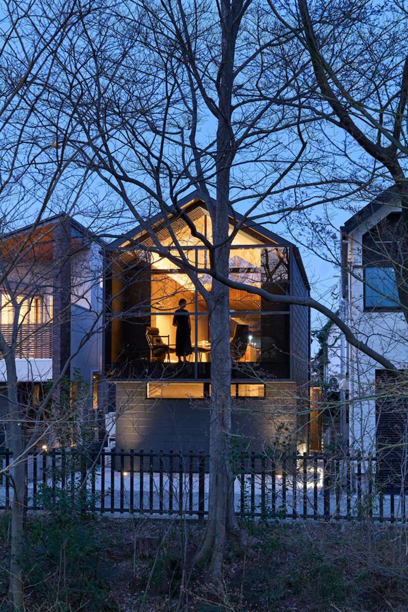 glassed-in balcony fronts apollo architects' timber 'grace' house in tokyo