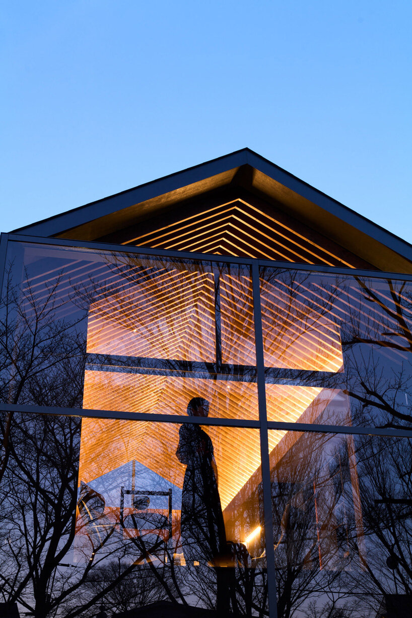 glassed-in balcony fronts apollo architects' timber 'grace' house in tokyo